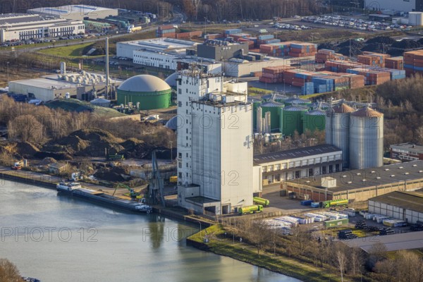 Aerial view Agravis silo tower concentrated feed plant in the industrial area east at the Wesel-Datteln canal in Dorsten in the Ruhr area in North Rhine-Westphalia, Germany, Agravis Raiffeisen AG, DE, Germany, Dorsten, Europe, commercial enterprises, commercial area, commercial park, commercial location, commercial use, industrial area, industrial building, industrial location, aerial view, aerial photograph, aerial photography, aerial photography, North Rhine-Westphalia, Ruhr area, overview, bird's-eye view, Wesel-Datteln Canal, birds-eyes view, compound feed manufacturer, overview