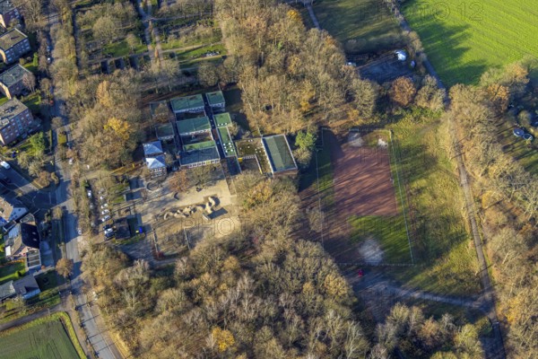 Aerial view of the Albert-Schweitzer-School and sports field in the district Hervest in the Glück-Auf-Straße in Dorsten in the Ruhr area in North Rhine-Westphalia, Germany, education, educational institution, DE, Germany, Dorsten, Europe, educational institute, aerial view, aerial photograph, aerial photography, aerial photography, North Rhine-Westphalia, Ruhr area, school, sports field, overview, bird's-eye view, overview