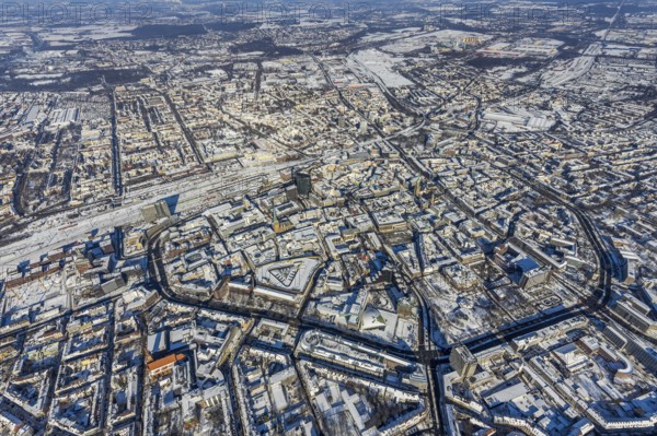 Aerial view, city centre, Wallring, central station, city, Dortmund, Ruhr area, North Rhine-Westphalia, Germany, railway tracks, railway station, DE, Deutsche Bahn AG, Europe, railway tracks, main station, aerial view, aerial photography, aerial photography, RWE Tower, snow, city view, city area, city centre, Thier-Galerie Dortmund, overview, bird's-eye view, winter, onset of winter, winter landscape, birds-eyes view, overview