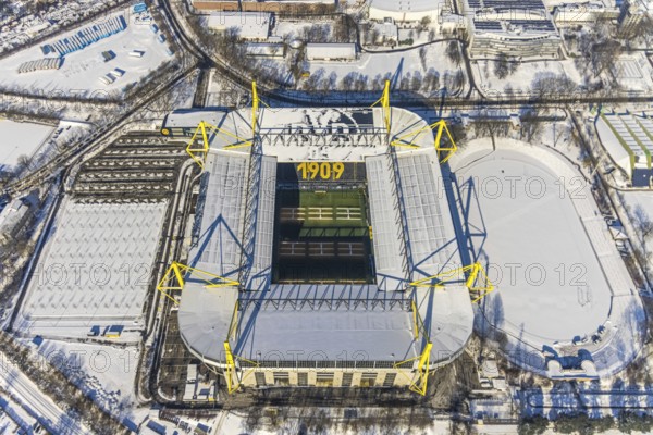 Aerial view, BVB stadium Signal Iduna Park, Westfalenhalle, Dortmund, Ruhr area, North Rhine-Westphalia, Germany, Bundesliga stadium, DE, Europe, aerial view, aerial photography, aerial photography, snow, overview, bird's-eye view, winter, onset of winter, winter landscape, birds-eyes view, overview