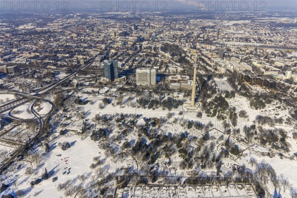 Aerial view, Westfalenpark and Florianturm in the snow, Ruhrallee, Dortmund, Ruhr area, North Rhine-Westphalia, Germany, observation tower, DE, Europe, television tower, landmark, aerial view, aerial photography, aerial photography, park, snow, overview, bird's-eye view, winter, onset of winter, winter landscape, birds-eyes view, overview