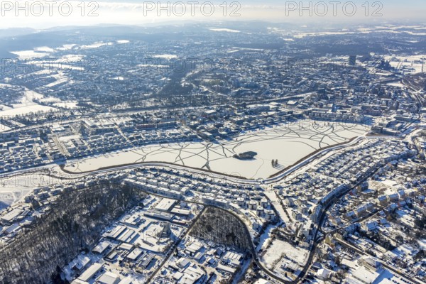 Aerial view, snowy Phoenix Lake, Hörde, Dortmund, Ruhr area, North Rhine-Westphalia, Germany, DE, Europe, aerial photography, aerial photography, aerial photography, snow, lake, overview, bird's eye view, winter, winter slump, winter landscape, birds-eyes view, overview, ice, ice surface, thin ice, break in the ice, breaks in the ice, snowy ice surface, artificial lake