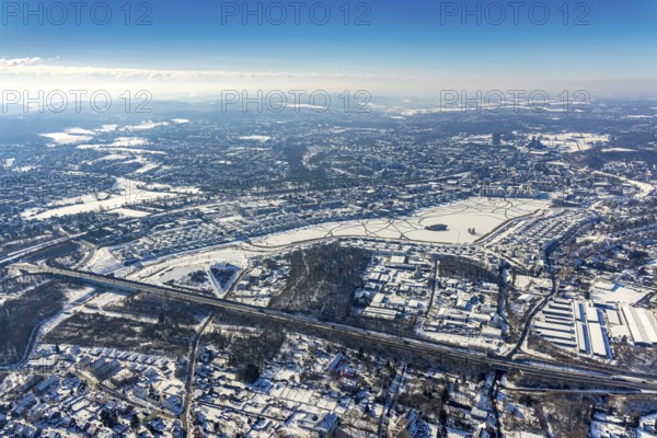 Aerial view, snowy Phoenix Lake, Hörde, Dortmund, Ruhr area, North Rhine-Westphalia, Germany, DE, Europe, aerial photography, aerial photography, aerial photography, snow, lake, overview, bird's eye view, winter, winter slump, winter landscape, birds-eyes view, overview, ice, ice surface, thin ice, break in the ice, breaks in the ice, snowy ice surface, artificial lake
