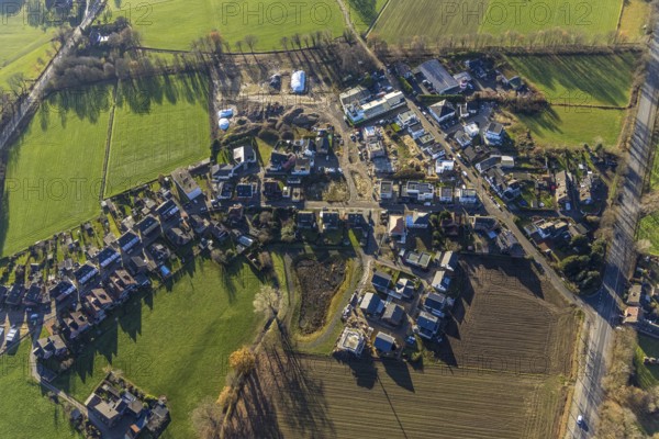 Aerial view of a construction site with residential development Auf dem Beerenkamp / Schwickingsfeld in Dorsten in the Ruhr area in North Rhine-Westphalia, Germany, construction work, construction, construction area, building site, building plots, construction project, construction site, DE, Dorsten, Europe, property tax, real estate, aerial view, aerial photograph, aerial photography, aerial photography, new construction, North Rhine-Westphalia, Ruhr area, overview, bird's-eye view, residential complex, living and living, residential area, residential buildings, residential quality, residential neighbourhood, housing estate, birds-eyes view, overview