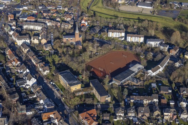 Aerial view of St John's Church in Beethovenstraße and St John's Catholic Kindergarten and Geschwister-Scholl-School next to the sports field in Dorsten in the Ruhr area in North Rhine-Westphalia, Germany, worship place, education, educational institution, DE, Germany, Dorsten, Europe, football pitch, religious community, place of worship, holy place, kindergarten, day nursery, day care centre, church, church community, day care centre, denomination, educational institute, aerial view, aerial photograph, aerial photography, aerial photography, North Rhine-Westphalia, religion, religious site, Ruhr area, school, sports facilities, sports field, sports facility, overview, bird's eye view, birds-eyes view, overview