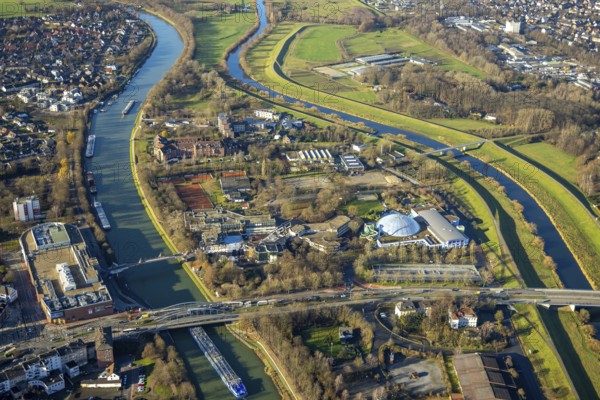 Aerial view Wesel-Datteln-Kanal with river Lippe and Lippeaue and Gymnasium Petrinum and leisure pool Atlantis at the Wesel-Datteln-Kanal in Dorsten in the Ruhr area in North Rhine-Westphalia, Germany, education, educational institution, DE, Germany, Dorsten, Europe, leisure facility, leisure area, leisure pool, leisure activities, leisure park, leisure enjoyment, grammar school, educational institute, aerial view, aerial photograph, aerial photography, aerial photography, North Rhine-Westphalia, Ruhr area, school, overview, bird's-eye view, Wesel-Datteln Canal, birds-eyes view, overview