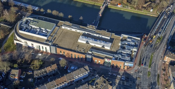 Aerial view of the shopping centre Mercaden Dorsten am Westwall am Wesel-Datteln-Kanal in Dorsten in the Ruhr area in North Rhine-Westphalia, Germany, bridge, DE, Germany, Dorsten, shopping centre, shopping mall, shopping markets, shopping place, shopping centre, Europe, Hochstadenbrücke, aerial view, aerial photograph, aerial photography, aerial photography, local supply centre, North Rhine-Westphalia, Ruhr area, shopping, shopping, shopping centre, overview, bird's eye view, Wesel-Datteln-Kanal, birds-eyes view, overview