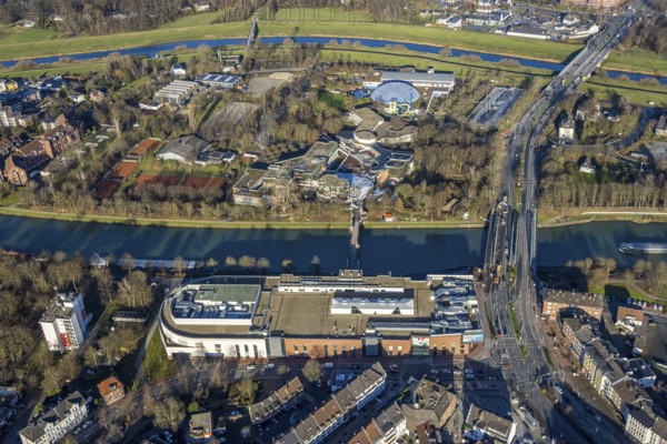 Aerial view of the shopping centre Mercaden Dorsten at the Westwall and Gymnasium Petrinum and leisure pool Atlantis at the Wesel-Datteln Canal in Dorsten in the Ruhr area in North Rhine-Westphalia, Germany, bridge, Crawleystraße, DE, Germany, Dorsten, shopping centre, shopping mall, shopping markets, shopping place, shopping centre, Europe, Hochstadenbrücke, Im Werth, aerial view, aerial photograph, aerial photography, aerial photography, local supply centre, North Rhine-Westphalia, Ruhr area, shopping, shopping, shopping centre, Dorsten municipal library, overview, VHS, bird's-eye view, Wesel-Datteln-Kanal, birds-eyes view, overview