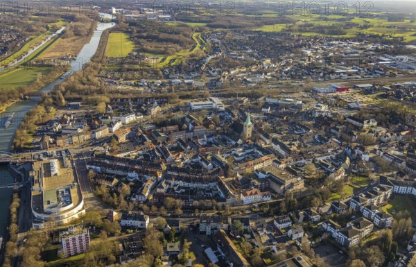 Aerial view of the city centre with Mercaden am Westwall and St. Agatha Catholic Church in Dorsten in the Ruhr area in North Rhine-Westphalia, Germany, Old town, place of worship, city, DE, Germany, Dorsten, shopping centre, shopping markets, shopping square, shopping mall, Europe, river Lippe, religious community, place of worship, holy place, city centre, church, parish, denomination, aerial view, aerial photograph, aerial photography, aerial photography, local supply centre, North Rhine-Westphalia, local view, religion, religious site, Ruhr area, shopping, shopping centre, townscape, city area, city centre, overview, bird's-eye view, Weser-Datteln-Kanal, birds-eyes view, overview