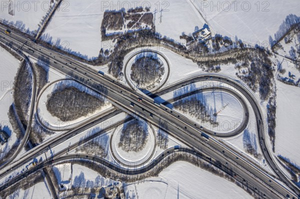 Aerial view, motorway junction Dortmund-Witten, A45 and A44, Persebeck, Dortmund, Ruhr area, North Rhine-Westphalia, Germany, motorway, motorway A44, motorway A45, DE, Europe, shapes and colours, aerial view, aerial photography, aerial photography, snow, overview, bird's-eye view, winter, onset of winter, winter landscape, birds-eyes view, overview