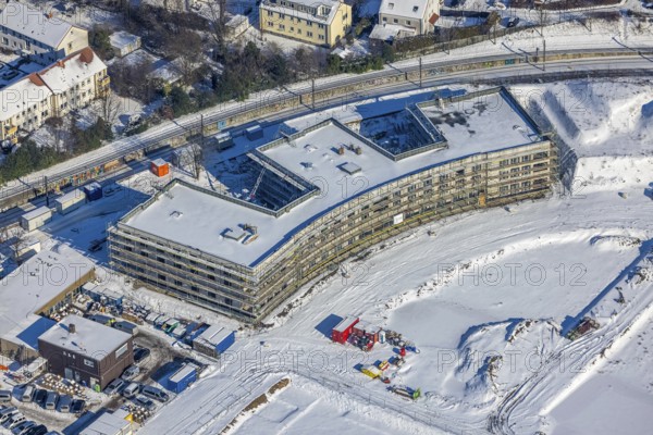 Aerial view, Hombrucher Bogen, construction site for commercial areas and apartment buildings, Barop, Dortmund, Ruhr area, North Rhine-Westphalia, Germany, construction work, construction area, construction site, building plots, construction project, construction site, DE, Europe, aerial view, aerial photography, aerial photography, new building, snow, overview, bird's eye view, winter, winter slump, winter landscape, birds-eyes view, former prefabricated concrete plant at Luisenglück, overview