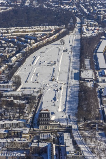 Aerial view, construction site Kronprinzenviertel for new residential area, Westfalendamm, Dortmund, Ruhr area, North Rhine-Westphalia, Germany, construction work, construction area, construction site, building plots, construction project, construction site, DE, Europe, aerial view, aerial photography, aerial photography, new building, snow, overview, bird's eye view, winter, winter onset, winter landscape, birds-eyes view, overview