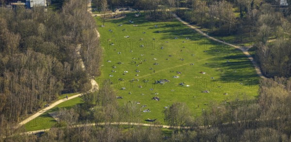 Aerial view, the Tremoniapark a large playground and sunbathing lawn, spring weather on Dortmund's sunbathing lawns, Dortmund, Ruhr area, North Rhine-Westphalia, Germany, DE, Europe, birds-eyes view, aerial view, aerial photography, aerial photography, overview, overview, bird's eye view, spring, summer weather in March, Dortmund sunbathing lawns, sunbathing with Corona distance