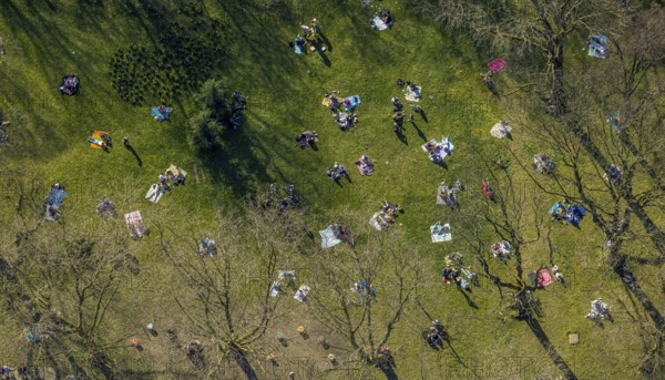 Aerial view, lawns in Westpark, spring weather on Dortmund's lawns, Dortmund, Ruhr area, North Rhine-Westphalia, Germany, DE, Europe, birds-eyes view, aerial view, aerial photography, aerial photography, overview, overview, bird's eye view, spring, summer weather in March, Dortmund's lawns, sunbathing with Corona distance