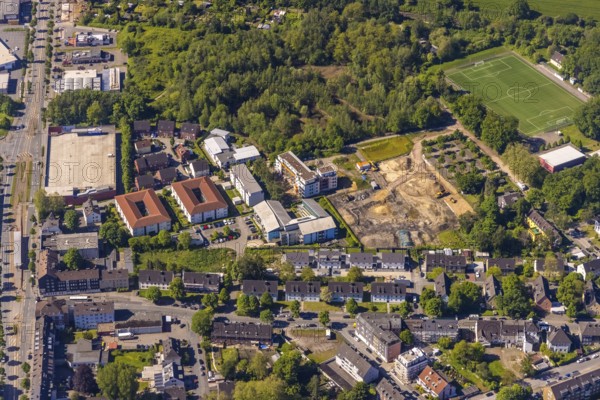 Aerial view, construction site and new building at Winterkampstraße, sports ground TUS Eving-Lindenhorst, Eving, Dortmund, Ruhr area, North Rhine-Westphalia, Germany, construction work, construction, construction area, construction site, building plots, construction project, construction site, DE, Europe, football pitch, football stadium, football club, aerial view, aerial photography, aerial photography, new building, sports facilities, sports facility, overview, bird's-eye view, overview