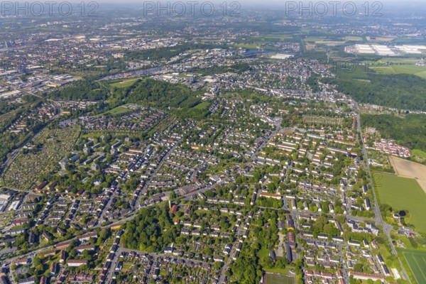 Aerial view, Kirdorf mining estate in the foreground in the Eving district, Dortmund, Ruhr area, North Rhine-Westphalia, Germany, workers' housing estate, DE, Europe, property tax, real estate, aerial view, aerial photography, aerial photography, overview, bird's-eye view, living and living, residential area, residential buildings, quality of life, birds-eyes view, overview