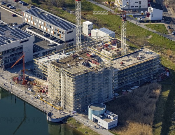 Aerial view, Phoenix-See, construction site for a new retirement home, high-rise building H12, Hörde, Dortmund, Ruhr area, North Rhine-Westphalia, Germany, construction work, construction area, construction site, building plots, construction crane, construction measure, construction project, construction site, DE, Europe, aerial view, aerial photography, aerial photography, new construction, Phoenix Lake, overview, bird's-eye view, former steelworks area Phoenix-East, artificial lake, overview