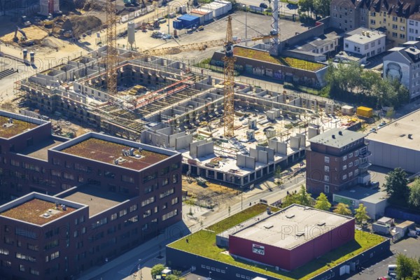 Aerial view, construction site residential complex at the Dortmunder U-Tower, Dortmunder U with the Ostwall Museum, Leisure Centre West, Dorstfelder Brücke, Dortmund, Ruhr area, North Rhine-Westphalia, Germany, construction work, building, construction area, building site, building plots, construction crane, construction, construction project, construction site, DE, Dortmunder U Centre for Art and Creativity, Emil-Moog-Platz, Europe, FZW, aerial view, aerial photography, aerial photography, new building, overview, bird's-eye view, Centre for Art and Creativity, birds-eyes view, overview