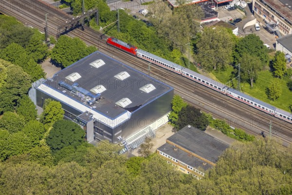 Aerial view, Brügmann sports hall next to the Leopold-Hoesch-Berufskolleg, Kaiserbrunnen, Dortmund, Ruhr area, North Rhine-Westphalia, Germany, railway tracks, DE, Europe, aerial view, aerial photography, aerial photography, sports hall, overview, bird's-eye view, train, birds-eyes view, overview