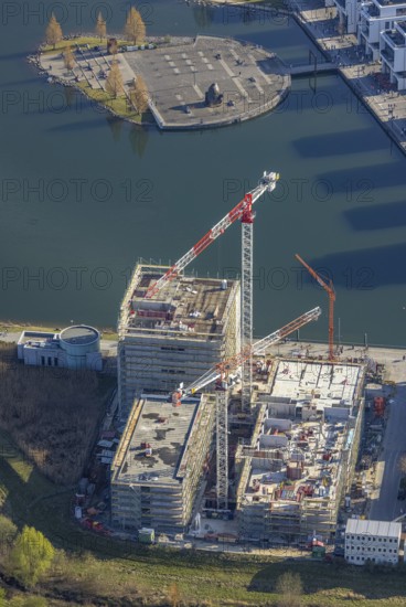 Aerial view, Phoenix-See, construction site for a new retirement home, high-rise building H12, Kulturinsel, Hörde, Dortmund, Ruhr area, North Rhine-Westphalia, Germany, construction work, construction area, construction site, building plots, construction crane, construction project, construction site, DE, Europe, Kulturinsel Phoenix-See, aerial view, aerial photography, aerial photography, new construction, Phoenix Lake, overview, bird's-eye view, former steelworks area Phoenix-Ost, artificial lake, overview