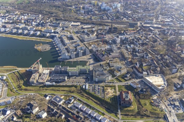 Aerial view, Phoenix-See, construction site for a new retirement home, high-rise building H12, Hörde, Dortmund, Ruhr area, North Rhine-Westphalia, Germany, construction work, construction area, construction site, building plots, construction crane, construction project, construction site, DE, Europe, cultural island Phoenix-See, aerial view, aerial photography, aerial photography, new construction, Phoenix lake, overview, bird's eye view, former steelworks area Phoenix-Ost, artificial lake, overview