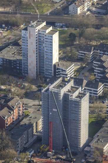 Aerial photo, demolition construction site high-rise building Kielstraße, project urban redevelopment west, rear high-rise building of the housing company DOGEWO21 in Heiligegartenstraße, Nordmarkt, Dortmund, Ruhr area, North Rhine-Westphalia, Germany, demolition horror house, construction work, construction area, construction site, building plots, building crane, construction project, building site, DE, Europe, property tax, high-rise building, real estate, aerial view, aerial photography, aerial photography, overview, bird's-eye view, residential complex, living and living, residential area, residential buildings, birds-eyes view, overview