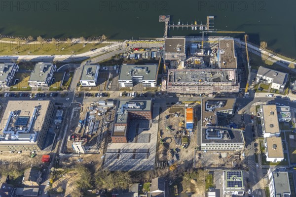 Aerial view, Phoenix-See, construction site residential complex Phönixseestraße, Kreuzknoten e.V. Sailing club, Hörde, Dortmund, Ruhr area, North Rhine-Westphalia, Germany, construction work, construction area, building site, building plots, construction crane, construction project, building site, boat mooring, DE, Europe, property tax, real estate, aerial photography, aerial photography, aerial photography, new construction, Phönixsee, Phönixseestraße, sailing boats, sports sailing jetty, overview, bird's-eye view, residential complex, living and living, residential area, residential buildings, residential quality, residential neighbourhood, birds-eyes view, former steelworks area Phoenix-Ost, artificial lake, overview