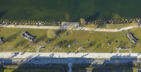 Aerial view, sunbathing at Lake Phoenix, spring weather on Dortmund's sunbathing lawns, Dortmund, Ruhr area, North Rhine-Westphalia, Germany, Marl, DE, Europe, birds-eyes view, aerial view, aerial photography, aerial photography, overview, overview, bird's eye view, spring, summer weather in March, Dortmund sunbathing lawns, sunbathing with Corona distance