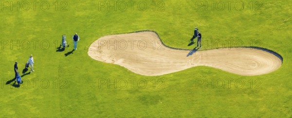 Aerial view, Dortmund racecourse with golf course, golfer at the bunker, golf club GolfRange Dortmund, golf course at the Dortmund racecourse in Wambel, Wambel, Dortmund, Ruhr area, North Rhine-Westphalia, Germany, DE, Europe, golf, golf course, golf club, golf range, golf player, golf meadow, aerial view, aerial photography, aerial photography, equestrian sport, equestrian centre, sport, overview, bird's eye view, birds-eyes view, overview