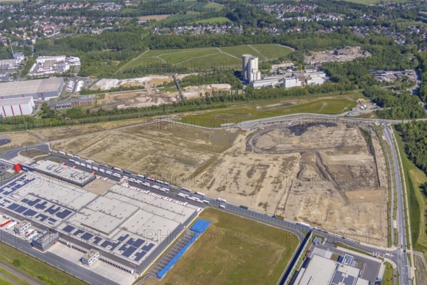 Aerial view, new REWE logistics centre and construction site of the former Westfalenhütte, Borsigplatz, Dortmund, Ruhr area, North Rhine-Westphalia, Germany, construction area, construction site, building plots, construction project, construction site, DE, Europe, commercial enterprises, commercial area, commercial park, commercial location, commercial use, industrial area, industrial building, industrial location, aerial view, aerial photography, aerial photography, overview, bird's-eye view, Westfalenhütte, birds-eyes view, overview
