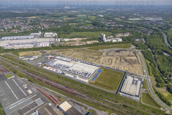 Aerial view, new REWE logistics centre and construction site of the former Westfalenhütte, Borsigplatz, Dortmund, Ruhr area, North Rhine-Westphalia, Germany, construction area, construction site, building plots, construction project, construction site, DE, Europe, commercial enterprises, commercial area, commercial park, commercial location, commercial use, industrial area, industrial building, industrial location, aerial view, aerial photography, aerial photography, overview, bird's-eye view, Westfalenhütte, birds-eyes view, overview