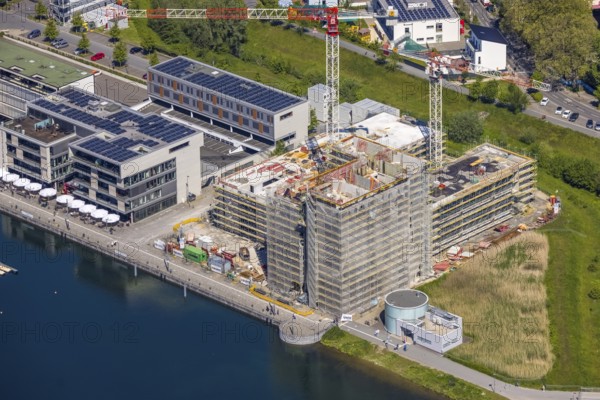 Aerial view, Phoenix Lake, construction site for a new retirement home, high-rise building H12, Hörde, Dortmund, Ruhr area, North Rhine-Westphalia, Germany, construction work, construction area, construction site, building plots, construction project, construction site, DE, Europe, property tax, harbour promenade, high-rise building* real estate, aerial view, aerial photography, aerial photography, new construction, Phoenix Lake, overview, bird's eye view, living and living, residential buildings, residential area, birds-eyes view, overview, Emscher, Emscher River