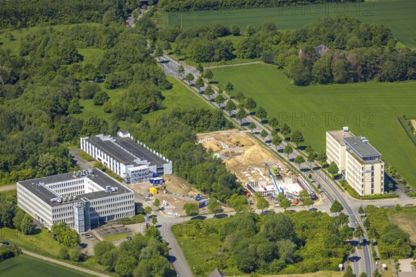 Aerial view, construction site and new construction office quarter Sebrathweg, Eichlinghofen, Dortmund, Ruhr area, North Rhine-Westphalia, Germany, construction work, construction, construction area, construction site, construction site, construction measure, row of trees, construction project, construction site, DE, Europe, commercial enterprises, commercial area, commercial location, commercial use, industrial area, industrial location, aerial view, aerial photography, aerial photography, new construction, overview, Verizon Germany, bird's eye view, birds-eyes view, overview