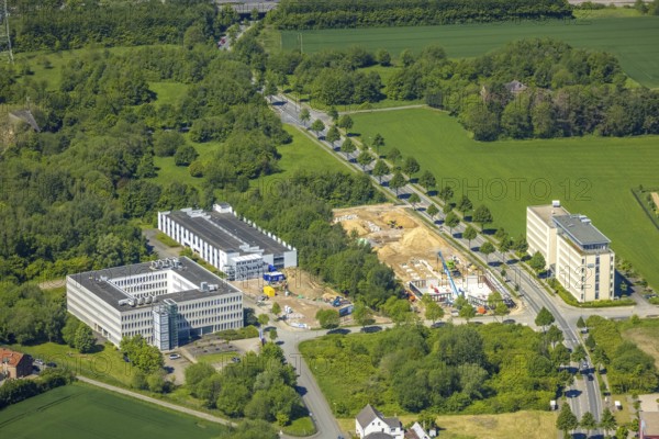 Aerial view, construction site and new construction office quarter Sebrathweg, Eichlinghofen, Dortmund, Ruhr area, North Rhine-Westphalia, Germany, construction work, construction, construction area, construction site, construction site, construction measure, row of trees, construction project, construction site, DE, Europe, commercial enterprises, commercial area, commercial location, commercial use, industrial area, industrial location, aerial view, aerial photography, aerial photography, new construction, overview, Verizon Germany, bird's eye view, birds-eyes view, overview