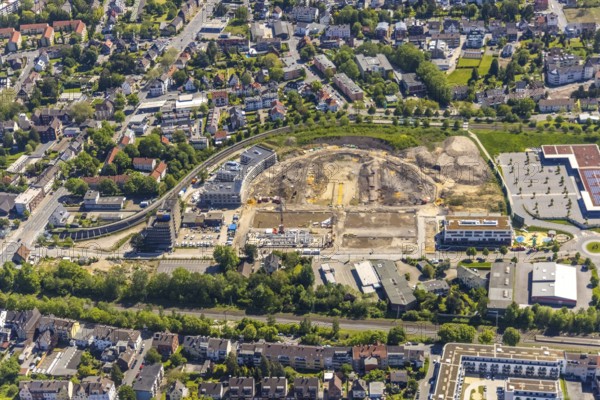 Aerial view, Hombrucher Bogen, construction site for commercial areas and apartment buildings, Menglinghausen, Dortmund, Ruhr area, North Rhine-Westphalia, Germany, construction work, construction area, construction site, building plots, construction project, construction site, DE, Europe, roundabout, roundabout, aerial view, aerial photography, aerial photography, new construction, snow, overview, bird's eye view, winter, winter slump, winter landscape, birds-eyes view, former prefabricated concrete plant at Luisenglück, overview