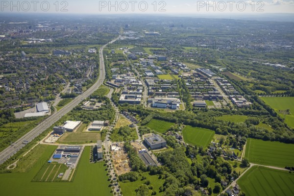 Aerial view, Dortmund University of Technology and Dortmund Technology Park, construction site and new construction Sebrathweg office quarter, A40 motorway, Oespel, Dortmund, Ruhr area, North Rhine-Westphalia, Germany, construction work, construction area, construction site, building plots, construction measure, row of trees, construction project, construction site, DE, Europe, commercial enterprises, commercial area, commercial area, commercial site, commercial use, university, industrial area, industrial site, aerial view, aerial photography, aerial photography, new building, TU Dortmund, Dortmund University of Technology, technology centre, overview, bird's-eye view, birds-eyes view, overview