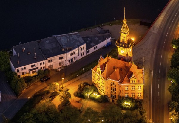 Aerial view, night view of Dortmund harbour, historic building old harbour office, coal port of the inland portDortmunder Hafen AG in Dortmund in the federal state of North Rhine-Westphalia, Germany, Dortmund, Ruhr area, North Rhine-Westphalia, DE, Europe, birds-eyes view, aerial view, aerial photography, aerial photography, overview, overview, bird's eye view, night flight, night shot, nightshot, twilight, inland port, inland port, Dortmund-Ems Canal, Speicherstraße