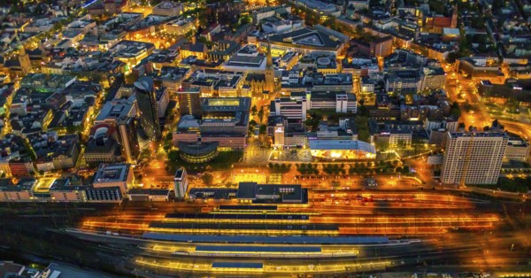 Aerial view, Dortmund main station and city centre, Harenberg City-Center, RWE Tower, German Football Museum, City, Dortmund, Ruhr area, North Rhine-Westphalia, Germany, railway station, station forecourt, DE, Deutsche Bahn AG, twilight photography, Europe, football, HCC Dortmund, Harenberg Kommunikation Verlags- u. Medien GmbH, central station, main station, light pollution, aerial view, aerial photography, aerial photography, museum, night, night shot, night flight, Dortmund City and State Library, overview, bird's-eye view, illuminated streets, birds-eyes view, nightflight, overview