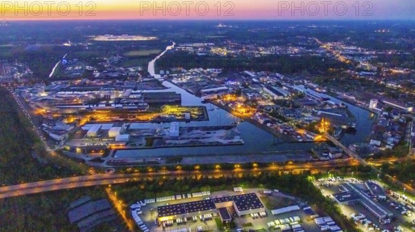 Aerial view, night view of Dortmund harbour, historical building old harbour office, container terminal, container, coal port of the inland portDortmunder Hafen AG in Dortmund in the federal state of North Rhine-Westphalia, Germany