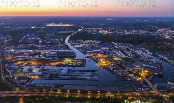 Aerial view, night view of Dortmund harbour, historical building old harbour office, container terminal, container, coal port of the inland portDortmunder Hafen AG in Dortmund in the federal state of North Rhine-Westphalia, Germany