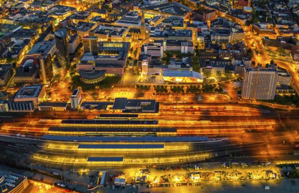Aerial view, Dortmund main station and city centre, Harenberg City-Center, RWE Tower, German Football Museum, City, Dortmund, Ruhr area, North Rhine-Westphalia, Germany, railway station, station forecourt, DE, Deutsche Bahn AG, twilight photography, Europe, football, HCC Dortmund, Harenberg Kommunikation Verlags- u. Medien GmbH, central station, main station, light pollution, aerial view, aerial photography, aerial photography, museum, night, night shot, night flight, Dortmund City and State Library, overview, bird's-eye view, illuminated streets, birds-eyes view, nightflight, overview