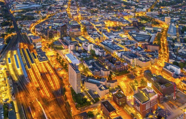Aerial view, Dortmund main station and city centre, Harenberg City-Center, RWE Tower, German Football Museum, City, Dortmund, Ruhr area, North Rhine-Westphalia, Germany, railway station, station forecourt, DE, Deutsche Bahn AG, twilight photography, Europe, football, HCC Dortmund, Harenberg Kommunikation Verlags- u. Medien GmbH, central station, main station, light pollution, aerial view, aerial photography, aerial photography, museum, night, night shot, night flight, Dortmund City and State Library, overview, bird's-eye view, illuminated streets, birds-eyes view, nightflight, overview