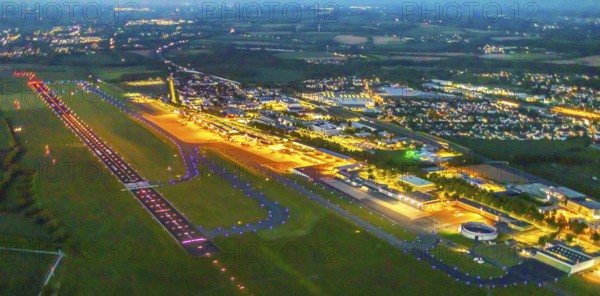 Aerial photo, Dortmund Airport, DTM, Wickede, Dortmund, Ruhr area, North Rhine-Westphalia, Germany, terminal building, DE, Dortmund Airport DTM, twilight photography, reception building, Europe, flight emission, airport, aircraft noise, airfield, runway, light pollution, aerial photograph, aerial photography, aerial photography, night, night photography, night flight, runway, overview, bird's-eye view, illuminated streets, birds-eyes view, nightflight, overview