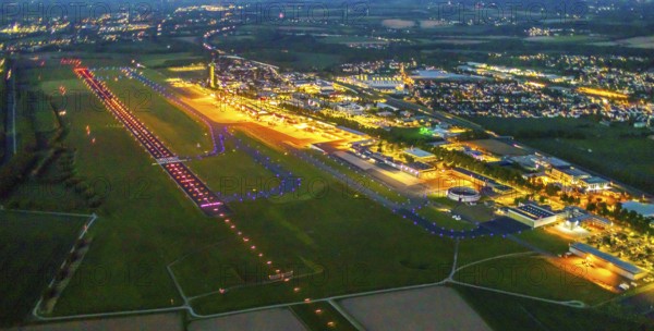 Aerial photo, Dortmund Airport, DTM, Wickede, Dortmund, Ruhr area, North Rhine-Westphalia, Germany, terminal building, DE, Dortmund Airport DTM, twilight photography, reception building, Europe, flight emission, airport, aircraft noise, airfield, runway, light pollution, aerial photograph, aerial photography, aerial photography, night, night photography, night flight, runway, overview, bird's-eye view, illuminated streets, birds-eyes view, nightflight, overview