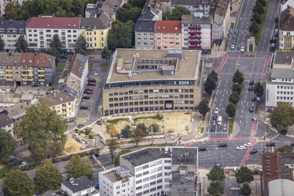 Aerial view, red cycle path marking at two intersections Brüderweg and Kaiserstrasse and construction site at Novi Sad Square in the Ruhrallee district of Dortmund, Ruhr area, North Rhine-Westphalia, Germany, construction work, construction area, building site, building plots, construction project, construction site, DE, Dortmund, Europe, intersection, aerial view, aerial photography, aerial photography, cycle path, road traffic, overview, bird's-eye view, overview
