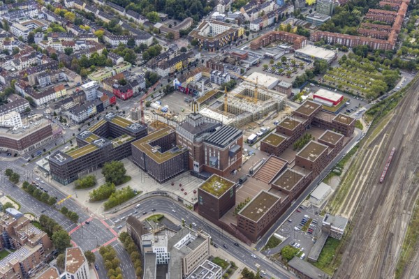 Aerial view, construction site and new construction of a residential complex at the Dortmund U-Tower with the Ostwall Museum and Leisure Centre West in the Dorstfelder Brücke district in Dortmund, Ruhr area, North Rhine-Westphalia, Germany, construction work, building, construction area, building site, building plots, construction crane, construction project, construction project, construction site, DE, Dortmund, Dortmunder U Centre for Art and Creativity, Emil-Moog-Platz, Europe, FZW, aerial view, aerial photography, aerial photography, new building, Robert-Bosch-Berufskolleg, overview, bird's-eye view, Centre for Art and Creativity, birds-eyes view, overview