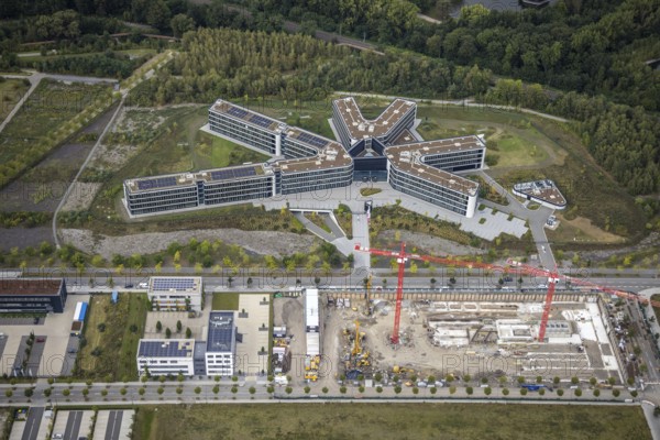 Aerial view, Phönix-West area with Amprion GmbH and construction site at Robert-Schuman-Straße in the district Hörde in Dortmund, Ruhr area, North Rhine-Westphalia, Germany, construction work, construction area, building site, building plots, construction project, construction site, DE, Dortmund, Europe, commercial enterprises, commercial area, commercial area, commercial park, commercial location, commercial use, industrial area, industrial building, industrial location, aerial view, aerial photography, aerial photography, new building, overview, bird's-eye view, overview