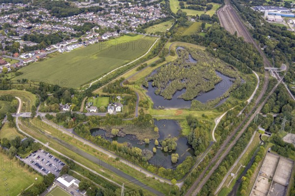 Aerial view, Dahlwiesenbach drainage ditch with overflow area east and west in the Alt-Scharnhorst district of Dortmund, Ruhr area, North Rhine-Westphalia, Germany, DE, Dortmund, Europe, aerial view, aerial photography, aerial photography, overview, bird's-eye view, overview