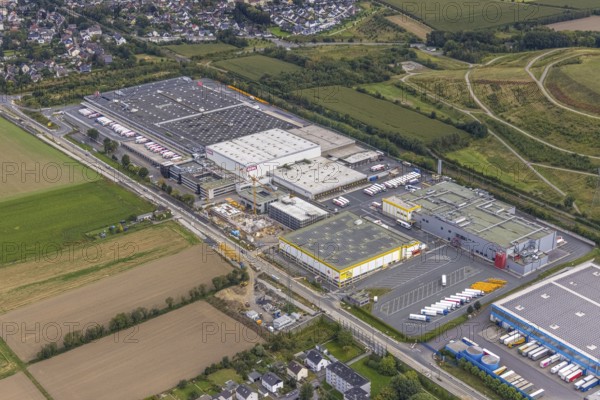 Aerial view, commercial area Brackeler Hellweg and construction site with new building in the district Asseln in Dortmund, Ruhr area, North Rhine-Westphalia, Germany, construction work, construction area, construction site, building plots, construction project, construction site, DE, Dortmund, Europe, commercial enterprises, commercial area, commercial park, commercial site, commercial use, industrial area, industrial site, aerial view, aerial photography, aerial photography, aerial photography, new building, overview, bird's eye view, birds-eyes view, overview