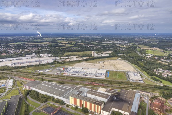 Aerial view, construction site with the new REWE logistics centre on Walzwerkstraße at the old Westfalenhütte in the Borsigplatz district of Dortmund, Ruhr area, North Rhine-Westphalia, Germany, construction area, building site, building plots, construction project, construction site, brownfield site, DE, Dortmund, Europe, commercial enterprises, commercial area, commercial area, commercial location, commercial use, industrial area, industrial location, logistics, logistics service, logistics service provider, logistics provider, logistics centre, aerial view, aerial photography, aerial photography, new construction, transport service, overview, bird's-eye view, overview